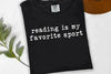 Reading is My Favorite Sport Graphic Tee by Anchored Grace Boutique