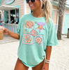 Shells Graphic Tee by Anchored Grace Boutique