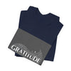 Gratitude is a Universal Language – T-Shirt by Tristan’s Treehouse