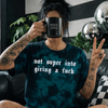 Teal not into giving a fuck embroidered tie dye T-shirt by Madness & Mayhem LLC