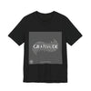 Gratitude is a Universal Language – T-Shirt by Tristan’s Treehouse