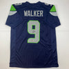 Autographed/Signed Kenneth Walker Seattle Blue Football Jersey Beckett BAS COA