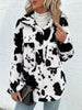 Trendy Black White Cozy Cow Print Collared Neck Button Up Fuzzy Jacket Modern & Warm Outerwear by Stevvex