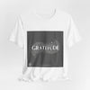 Gratitude is a Universal Language – T-Shirt by Tristan’s Treehouse