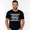 Immigrants Are Not Criminals But The President Is Funny T-Shirt – Unisex Political Slogan Tee by Dog Mom Hat