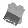 Gratitude is a Universal Language – T-Shirt by Tristan’s Treehouse
