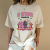 Women's Halloween Graphic T-Shirt – "In October We Wear Pink" Lettering with Ghosts Pumpkins Candy Design by Dog Mom Hat