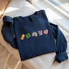 "Lucky Charm" Embroidered-Style Sweatshirt by Dog Mom Hat