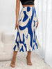 Women's Zebra Print Pleated Skirt – Irregular Hem & Side Slit by FitiqueFit