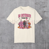 Women's Halloween Graphic T-Shirt – "In October We Wear Pink" Lettering with Ghosts Pumpkins Candy Design by Dog Mom Hat