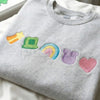Embroidered Lucky Charm Sweatshirt – St. Patrick’s Day Shamrock & Rainbow Crewneck
