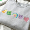 "Lucky Charm" Embroidered-Style Sweatshirt by Dog Mom Hat