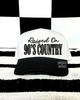 Raised on 90s country embroidered hat (black/white) by Madness & Mayhem LLC