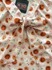 Pink Jack-o’-lantern Bow Top by Retrolicious