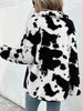 Trendy Black White Cozy Cow Print Collared Neck Button Up Fuzzy Jacket Modern & Warm Outerwear by Stevvex