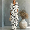 Women's Waist-Cinched V-Neck Printed Wide-Leg Jumpsuit by FitiqueFit