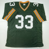 Autographed/Signed Aaron Jones Green Bay Green Football Jersey Beckett BAS COA