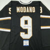 Autographed/Signed Mike Modano Dallas Black Hockey Jersey Beckett BAS COA