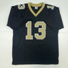 Autographed/Signed Michael Thomas New Orleans Black Football Jersey Beckett BAS COA