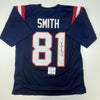 Autographed/Signed Jonnu Smith New England Blue Football Jersey Beckett BAS COA