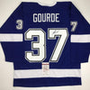 Autographed/Signed Yanni Gourde Tampa Bay Blue Hockey Jersey JSA COA