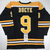 Autographed/Signed Johnny John Bucyk HOF 1981 Boston Black Hockey Jersey JSA COA