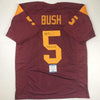 Autographed/Signed Reggie Bush 05 Heisman USC Southen Cal Maroon College Football Jersey Beckett BAS COA