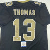 Autographed/Signed Michael Thomas New Orleans Black Football Jersey Beckett BAS COA