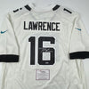 Autographed/Signed Trevor Lawrence Jacksonville Jaguars White Nike Game Football Jersey Fanatics COA
