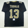 Autographed/Signed Michael Thomas New Orleans Black Football Jersey Beckett BAS COA
