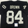 Autographed/Signed Antonio Brown Oakland Black Football Jersey Beckett BAS COA