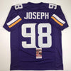 Autographed/Signed Linval Joseph Minnesota Purple Football Jersey JSA COA