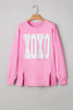 Pink Bow Sequin XOXO Letter Graphic Exposed Seam Baggy Sweatshirt by Wild and Free Boutique
