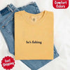 He’s Fishing Comfort Colors Tee – Funny Relaxed Fit Shirt for Women by Adorb Custom Tees
