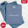 He’s Watching Football Tee - Comfort Colors Funny Shirt for Her by Adorb Custom Tees