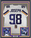 Framed Autographed/Signed Linval Joseph 35x39 Minnesota White Football Jersey JSA COA