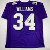 Autographed/Signed Ricky Williams Baltimore Purple Football Jersey Beckett BAS COA