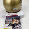 Autographed/Signed Rudy Ruettiger Go Irish Notre Dame Football Mini Helmet JSA COA