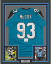 Framed Autographed/Signed Gerald McCoy 35x39 Carolina Blue Football Jersey Beckett BAS COA