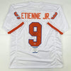 Autographed/Signed Travis Etienne Jr. Clemson White College Football Jersey Beckett BAS COA