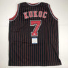 Autographed/Signed Toni Kukoc Chicago Black Pinstripe Basketball Jersey Beckett BAS COA
