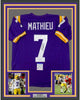 Framed Autographed/Signed Tyrann Mathieu Inscribed Honey Badger 35x39 LSU Purple College Football Jersey PSA/DNA COA