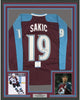 Framed Autographed/Signed Joe Sakic 35x39 Colorado Maroon Hockey Jersey Beckett BAS COA
