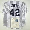 Autographed/Signed Mariano Rivera New York Pinstripe Baseball Jersey JSA COA/LOA