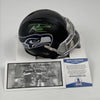 Autographed/Signed Russell Wilson Seattle Seahawks Eclipse Football Mini Helmet Beckett BAS COA