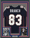 Framed Autographed/Signed Deion Branch 35x39 Super Bowl XXXIX MVP New England Blue Football Jersey Tristar COA