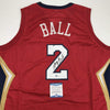 Autographed/Signed Lonzo Ball New Orleans Red Basketball Jersey Beckett BAS COA
