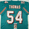 Autographed/Signed Zach Thomas Miami Teal Football Jersey JSA COA