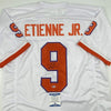 Autographed/Signed Travis Etienne Jr. Clemson White College Football Jersey Beckett BAS COA