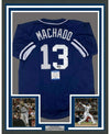 Framed Autographed/Signed Manny Machado 35x39 San Diego Blue Baseball Jersey Beckett BAS COA